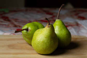 pears on a wooden table