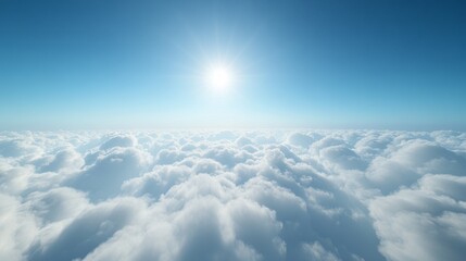 Fototapeta premium Above the clouds, with a vibrant blue sky