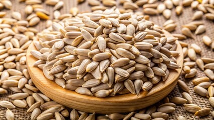 Obraz premium Raw organic sunflower kernels with husk removed, nutritious, snack, vegan, vegetarian, healthy, seeds, organic, sunflower