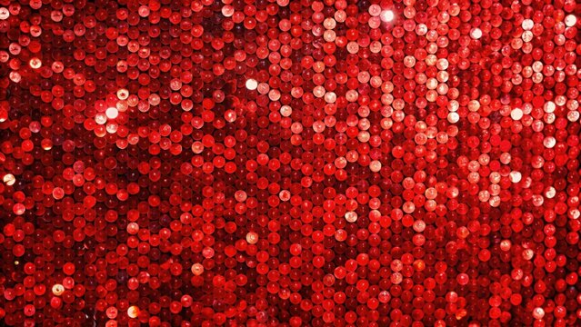 Shiny red sequins on a glittery background , red, sequins, shiny, glitter, deep, vibrant, sparkly, beautiful, festive