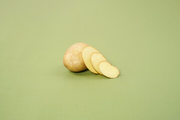 Washed potatoes, organic potato isolated on white background. Young potatoes. Peel potatoes.Harvesting collection. organic, freshly dug potatoes. Vegan. Vegetables.Potato slices.