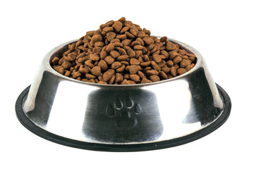 Brown cat or dog kibble in a metal bowl isolated. Nutritious healthy diet pet food scattered around, falls and cascades the bowl. Dry cat or dog food spills from a bowl.