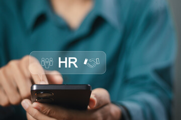 Human resources management concept, Businessman using smartphones with modern online technology to...