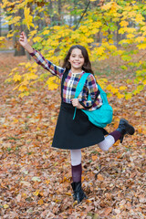 Education for adolescence. Teen girl in autumn park outdoor. Autumn time to study. Knowledge and education. School education. Student life. Back to school. Autumn girl with school bag. Hello fall