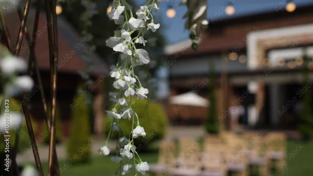 Wall mural an arch for a wedding ceremony in a flower garden