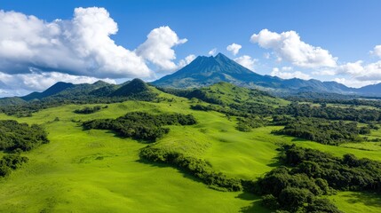 Obraz premium Majestic Mountain Range with Lush Green Valley and Blue Sky in Honduras