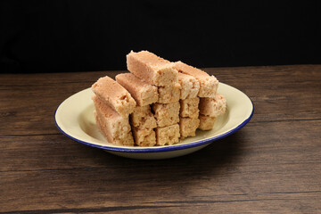 Traditional Indian Milk Cake Alwar Ka Mawa dry flaky biscuit like sweet treat