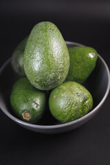  slice of avocado on wooden table 