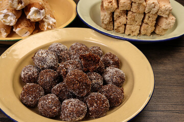 Traditional sweet treat Narkel Naru Coconut ladoo laddu with Jaggery