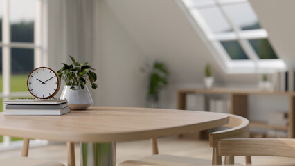 A minimalist wooden table featuring copy space for displaying products, set in a minimalist home.