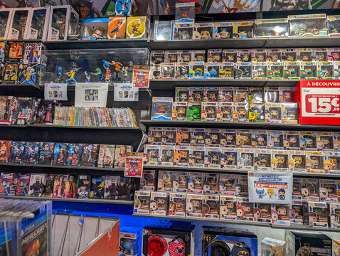 France, 19 August 2024 : Shelves Displaying Funko Pop Figures And Manga In Store