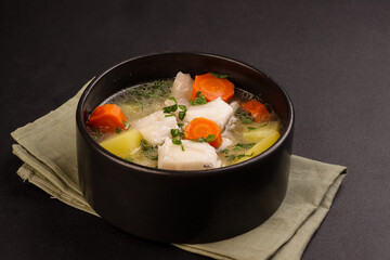 Ukha is Russian Fish Soup, With Potato and Carrot. 