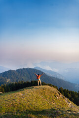 A man show strong arm to you on the mountain, Manali, Himachal Pradesh, India.