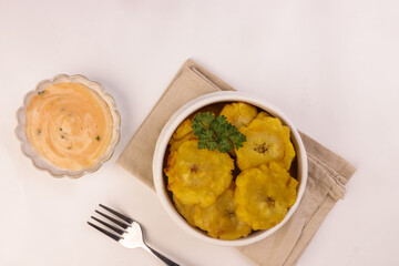 Patacon or Tostones is Fried and Flattened of Green Plantain.