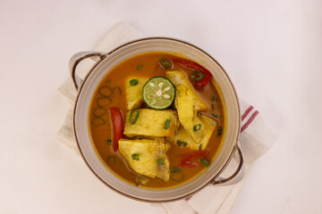 Moqueca is Brazilian Fish Stew With Coconut Milk and Tomato. 