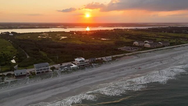 sunset over Vilano Beach, Florida, coastline, homes, and peaceful ocean waves