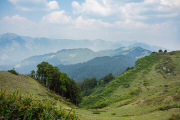 India's breathtaking mountain views boast majestic peaks, lush valleys, and serene landscapes in Shoja Himachal pradesh india. 