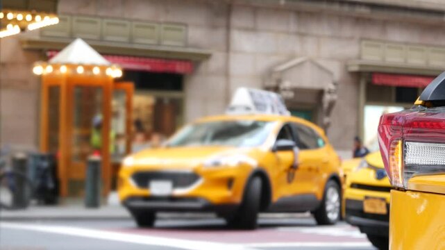 New York City Grand Central Terminal railway station, 42 street. Manhattan Midtown. Yellow taxi cabs, car transport on Pershing Square, NYC USA. American urban road traffic, people,telephone box kiosk