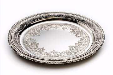 ornate silver plate with intricate floral design on white background