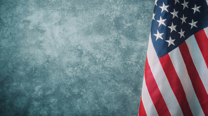 Obraz premium American flag stands proudly against textured background, symbolizing patriotism and national pride. Its vibrant colors evoke sense of unity and remembrance