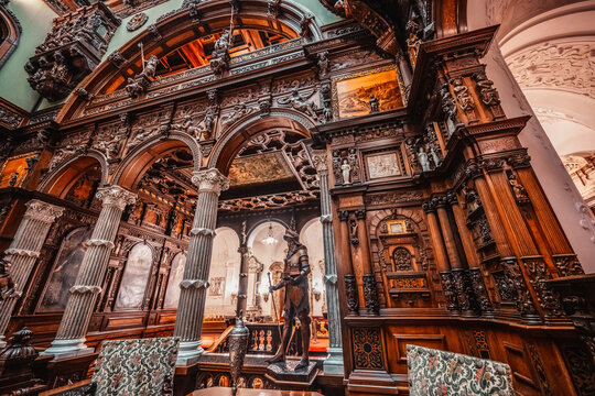 Hall stairs and Hall of Honor in Peles Castle. The Peles castle in the town of Sinaia, Transylvania, Carpathian Mountains, Romania
