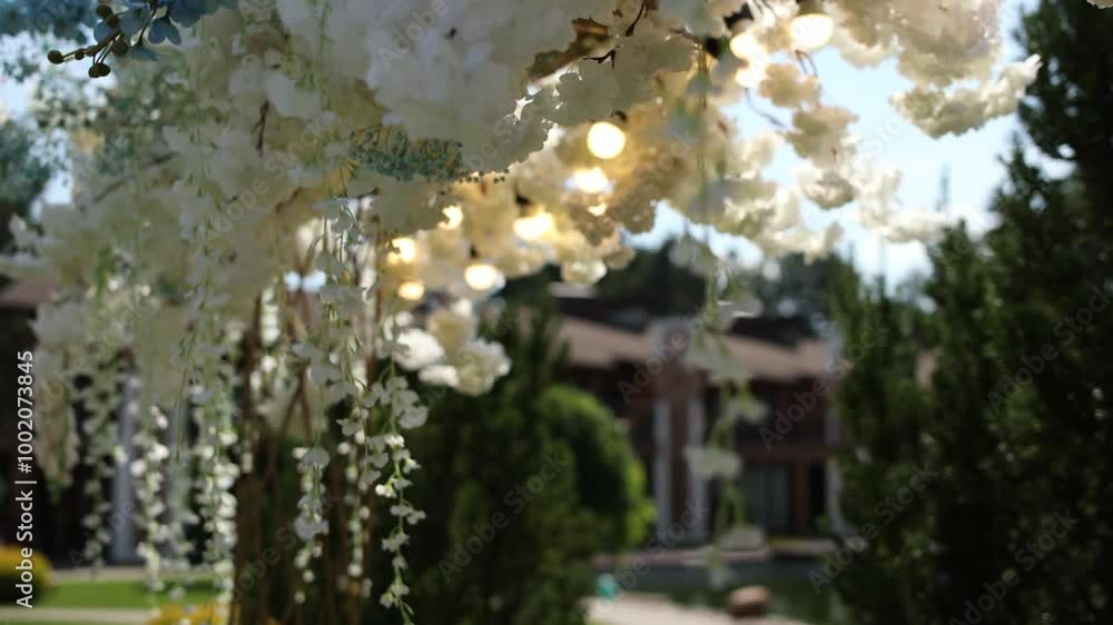 Wall mural an arch for a wedding ceremony in a flower garden