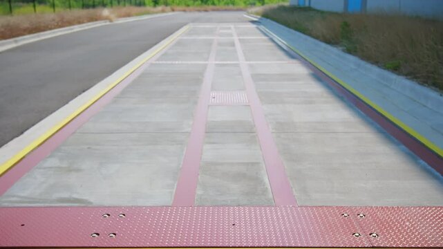 Truck weigh stations on road. Industrial equipment for measuring weight.