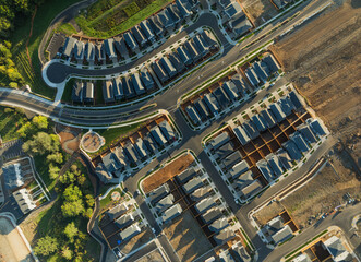 A residential area with many houses and a few trees