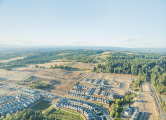 A view of a residential area with houses and trees