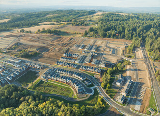 A view of a residential area with houses and trees