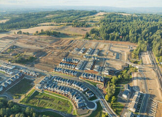 A view of a residential area with houses and a road