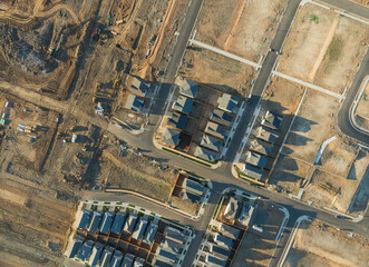 A view of a residential area with houses and a street