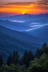 Naklejka premium Beautiful sunset over rolling hills and valleys, showcasing vibrant colors and layered mountains in a serene landscape