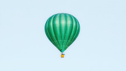 Fototapeta premium Green Hot Air Balloon in Blue Sky