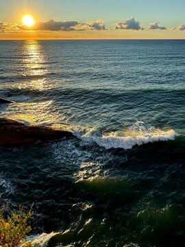 Sea waves, sun, clouds, beautiful seascape.