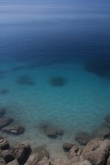 Obraz premium Tranquil ocean view with rocky coastline