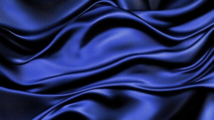 Fototapeta premium Luxurious blue satin fabric with soft, flowing folds creating a smooth and glossy texture, ideal for backgrounds, fashion, or textile design projects
