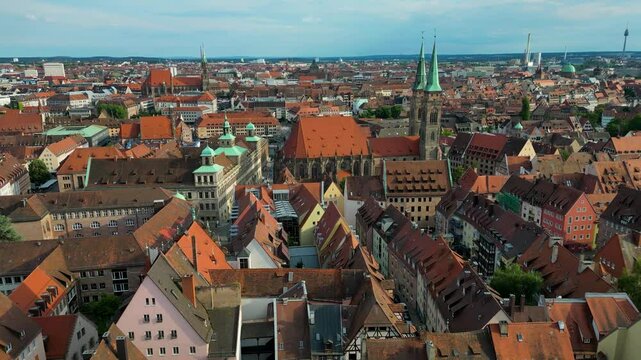 4K Aerial Drone Video of the Copper-clad Twin Spiers on the Beautiful St. Sebald Church in Downtown Nurnberg, Germany