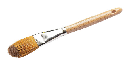 Fototapeta premium A brush with gold paint, isolated on a white background