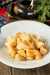 Fried potato wedges with salt and pepper powder