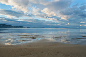 Wooden walking track built on the sea. Wooden bridge by the sea. Walking track with wooden floor and iron railings built in the sea. Quay walking area. Sea of ​​Erdek.