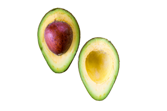 Half avocado on the yellow background, space for text