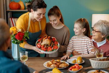 Family celebrating Thanksgiving Day