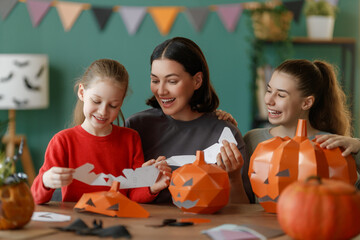 Fototapeta premium Happy family preparing for Halloween.