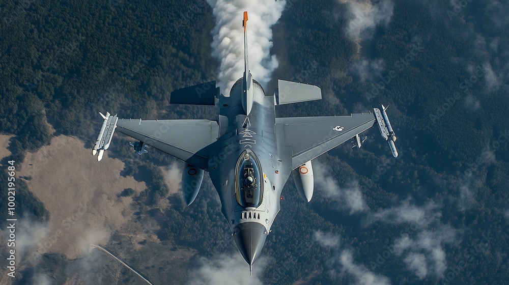 Poster dramatic dive of a powerful fighter jet leaving a smoky trail in its wake as the captures its intens