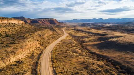 Wide view of a road trip holiday route through a desert landscape, leaving room for copy.