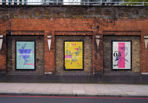 Mockup Of Three Vertical Customized Posters On Brick Wall