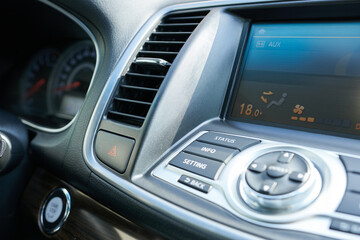 Obraz premium Interior of a modern car, detail of a car's dashboard