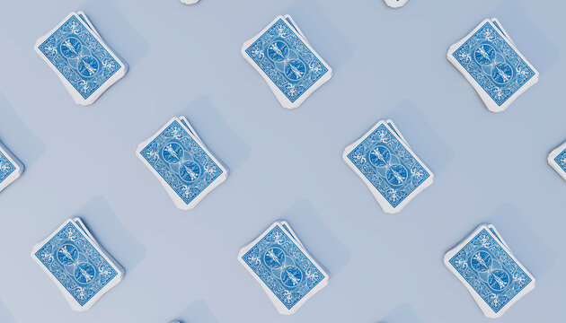 3D render of playing cards on blue background