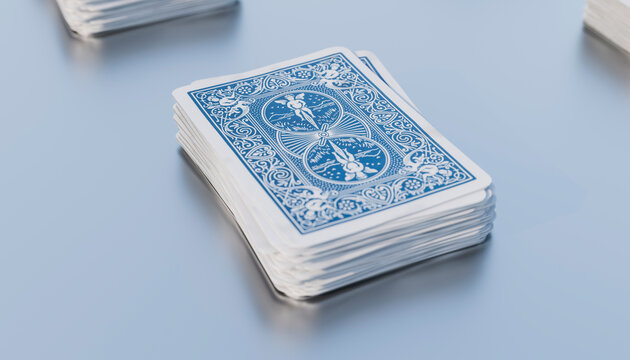 Playing cards with blue pattern stacked on each other